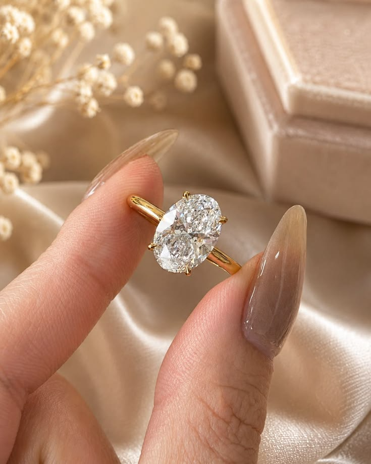 Oval Diamond Solitaire Rings